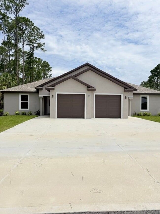 Building Photo - Brand new duplex with screen porch ! Unit A