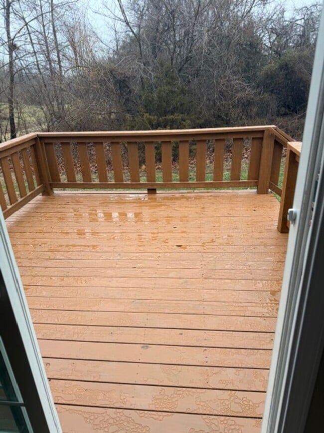 Photo - 3 Bedroom 2 full bath home with oversized 2 car garage new vinyl flooring and community pool access