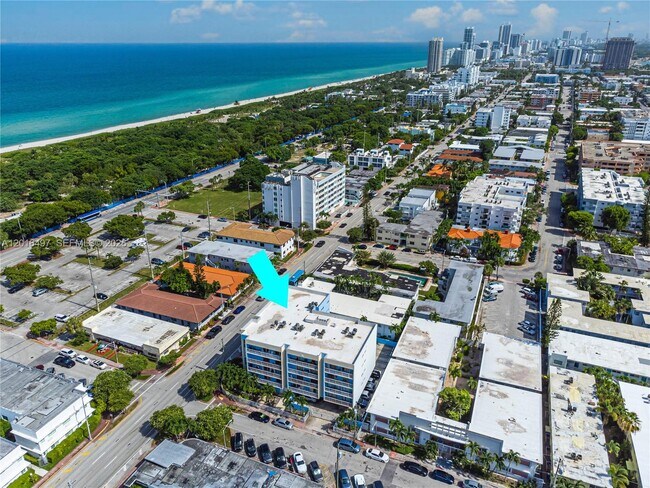 Building Photo - 8340 Harding Ave Unit 201