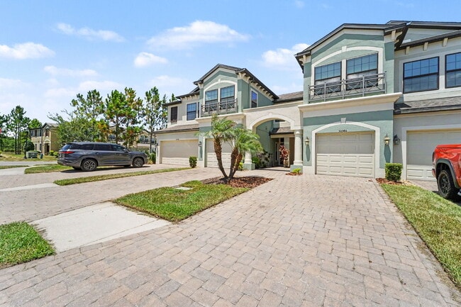 Photo - Spacious 3-Bed, 2.5-Bath Townhouse with 1-Car Garage in Windermere Estates at Wiregrass Ranch