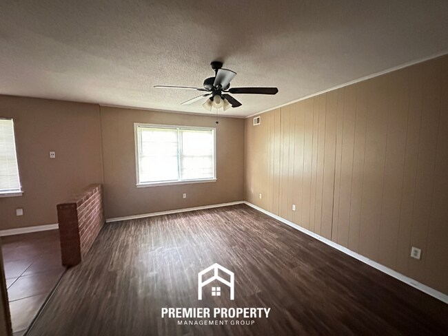 Move-In Ready 4BR Home in 38134 - Airy Living Spaces & Private Backyard