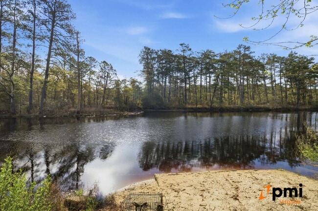 Photo - Stunning 5 Bedroom Waterfront Home with 2 car garage