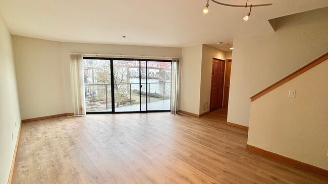 Photo - Spacious 2BR/2BA Condo – 1,086 SF + Parking + River Views | NW Portland