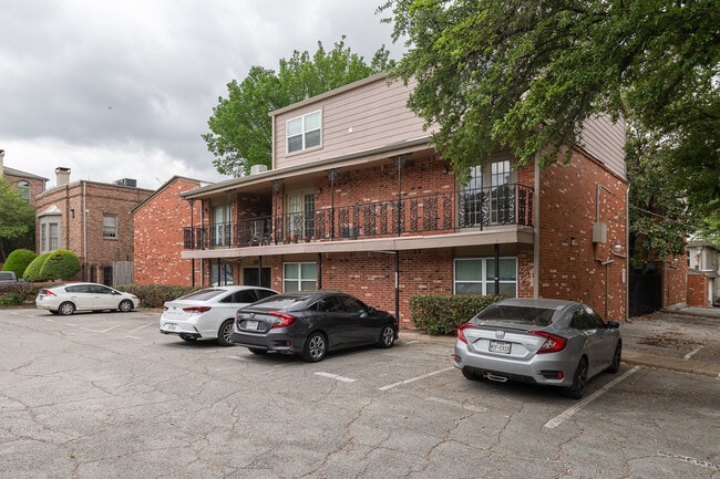 Front of Building. Unit includes 2 reserved parking spots. - 4525 Gilbert Ave Unit 207