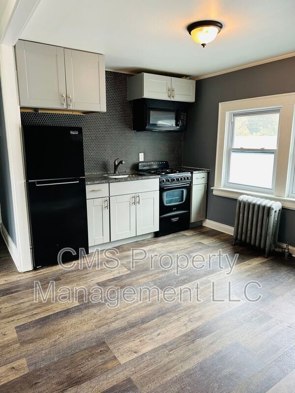 Building Photo - 301 E 9th Ave Unit Apt. #3