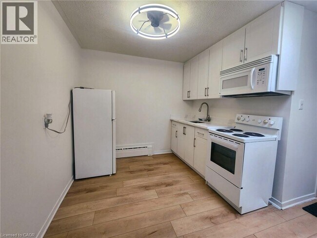 Photo - 250 King St E Unit 2
