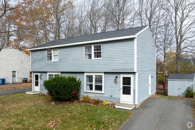 Drive way that can park three cars.