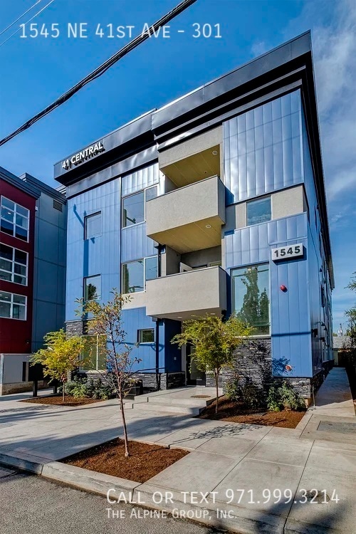 Building Photo - 1545 NE 41st Ave Unit 301