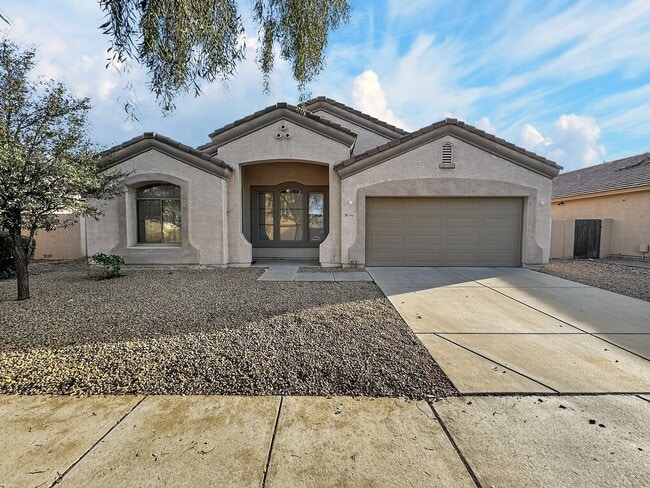 Building Photo - Single-level 4 bed, 2 bath home with tandem 3-car garage and RV gate.