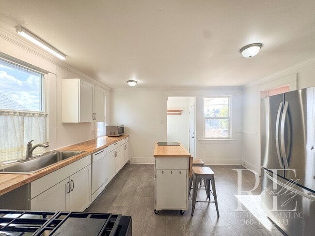 Photo - Light-Filled Home with Vaulted Ceilings, B...