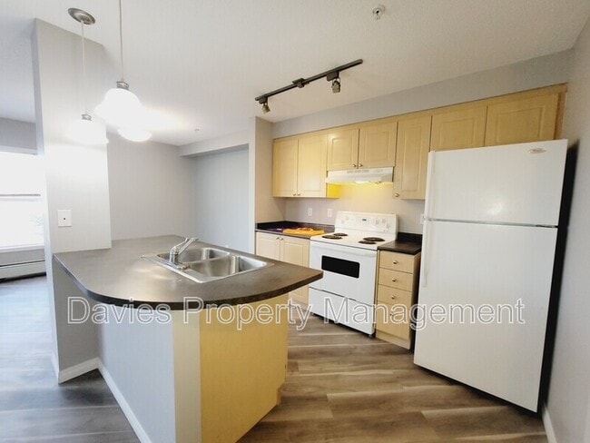 Photo - 622 McAllister Loop SW Unit #306