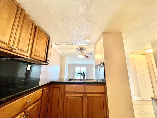 Photo - 9915 W Okeechobee Rd Unit 2-506
