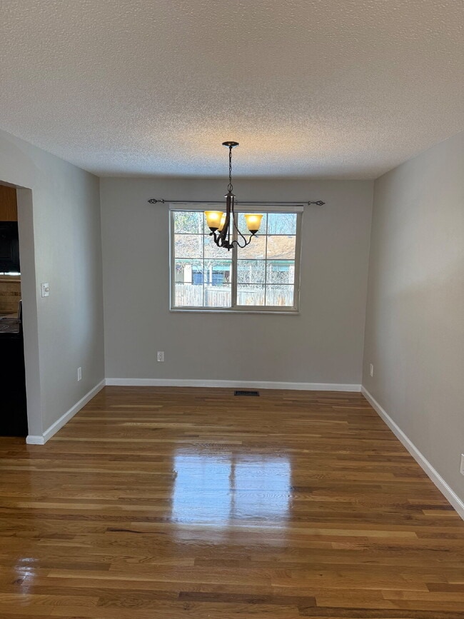 Photo - "Spacious 4-Bed Lakewood Gem with Hardwood Floors, Finished Basement & Fireplace - 2970 Sq Ft!"