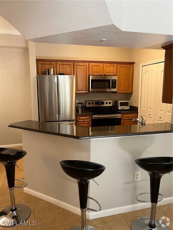 Building Photo - 12975 Positano Cir Unit 202 Rental