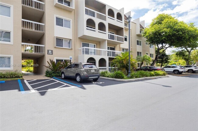 Building Photo - 7707 Camino Real Unit 209