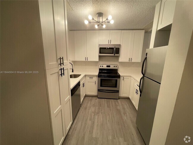 Building Photo - 14931 SW 82nd Ln Unit 18-406 Rental