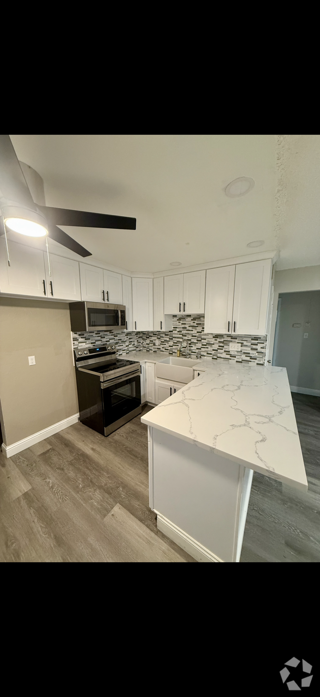 Building Photo - 1707 W Swain Rd Unit 6 Rental