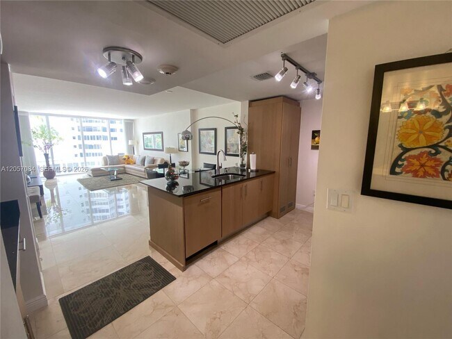 10275 Collins Ave Unit 215