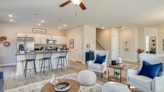 A living room you won't want to leave - Hillpoint Preserve Townhome Apartments