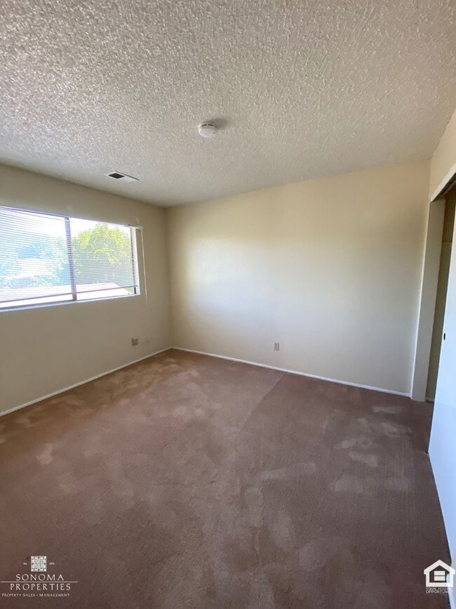 Photo - Townhouse in Desirable Location, Near Shopping, Bike Trails, Water & Garbage Included