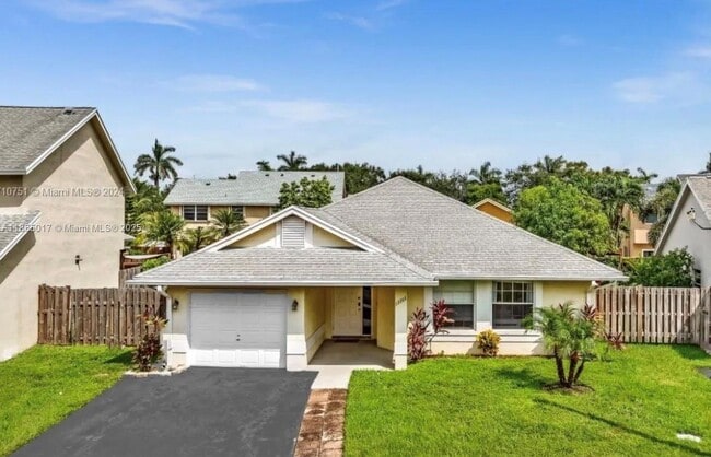 Building Photo - 12265 NW 32nd Manor Rental