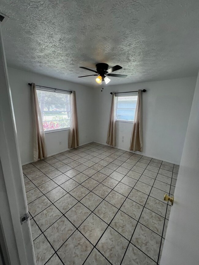 Photo - 3 BEDROOM 2 BATH CONVENIENTLY LOCATED WITH A TROPICAL OASIS IN THE BACK YARD!
