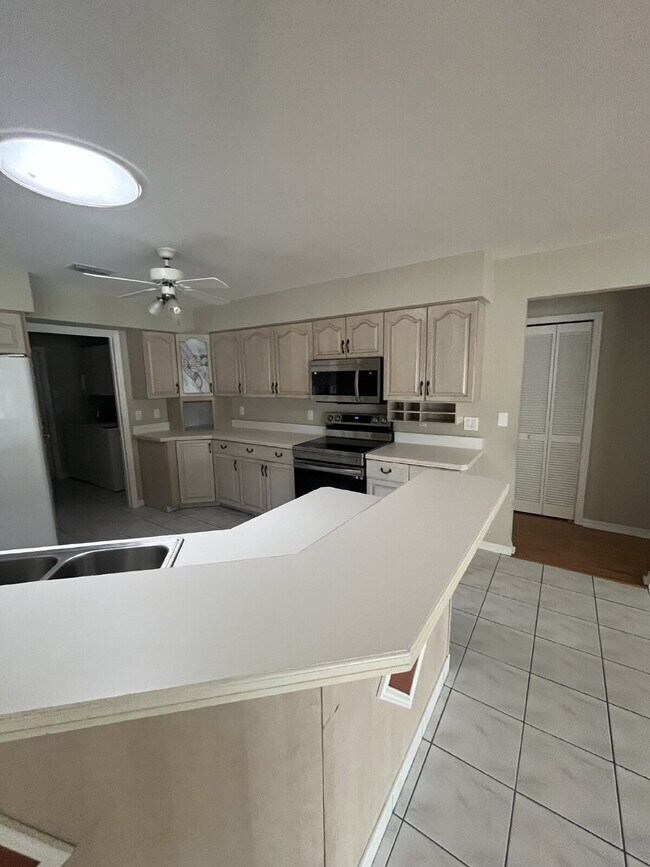 Photo - Spacious Pool Home in Desirable Palm Harbor – Pool Care Included