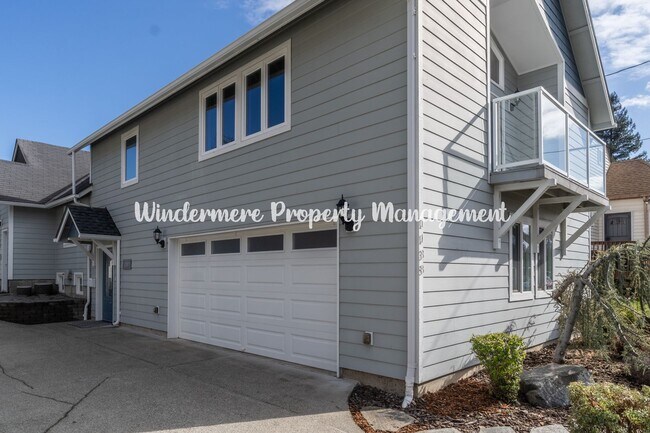 Photo - Beautifully Remodeled 2 bedroom in convenient location, private balcony, over sized garage, A/C a...