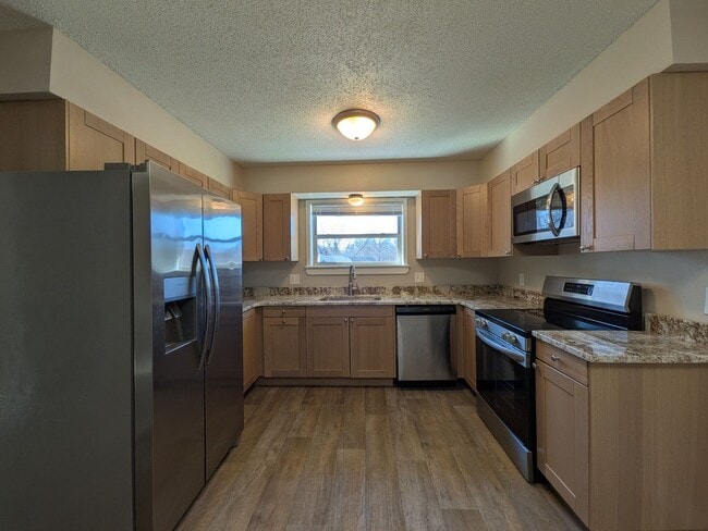 Photo - Pet friendly split-level 3 bedroom, 1 bathroom bi-attached home!
