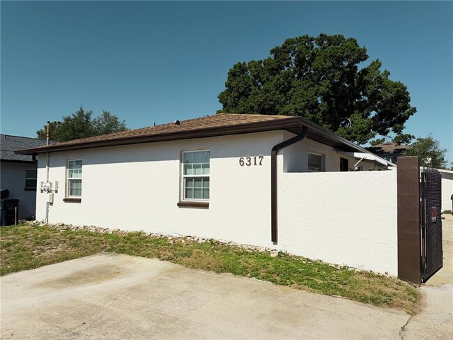 Building Photo - 6317 S Roberts Ave Unit A
