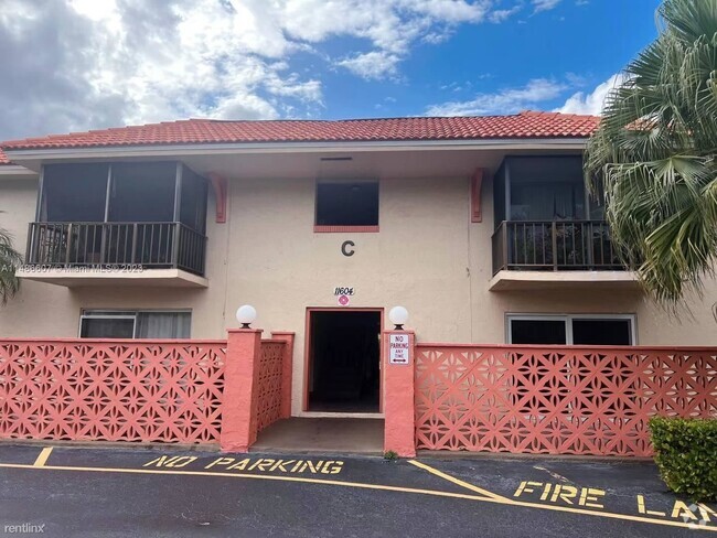 Building Photo - 2 br, 1.5 bath Condo - 11604 NW 29th Ct Ap... Unit Apt C4