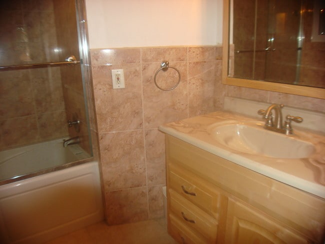 Partial view of master bathroom with jacuzzy - 6276 186th NW St Unit #307 Mediterranean Villas