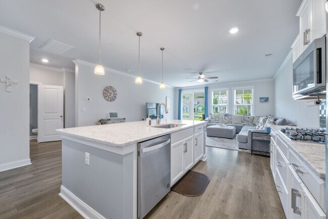 Photo - Stunning 5BR Home on Corner Lot with Upstairs Bonus Area & 2-Car Garage