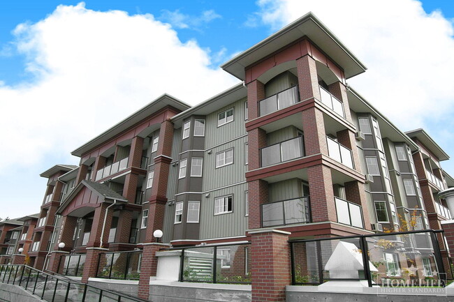 Building Photo - 2 Bed + 2 Bath + 1 Den Condo for Rent in L... Unit 203