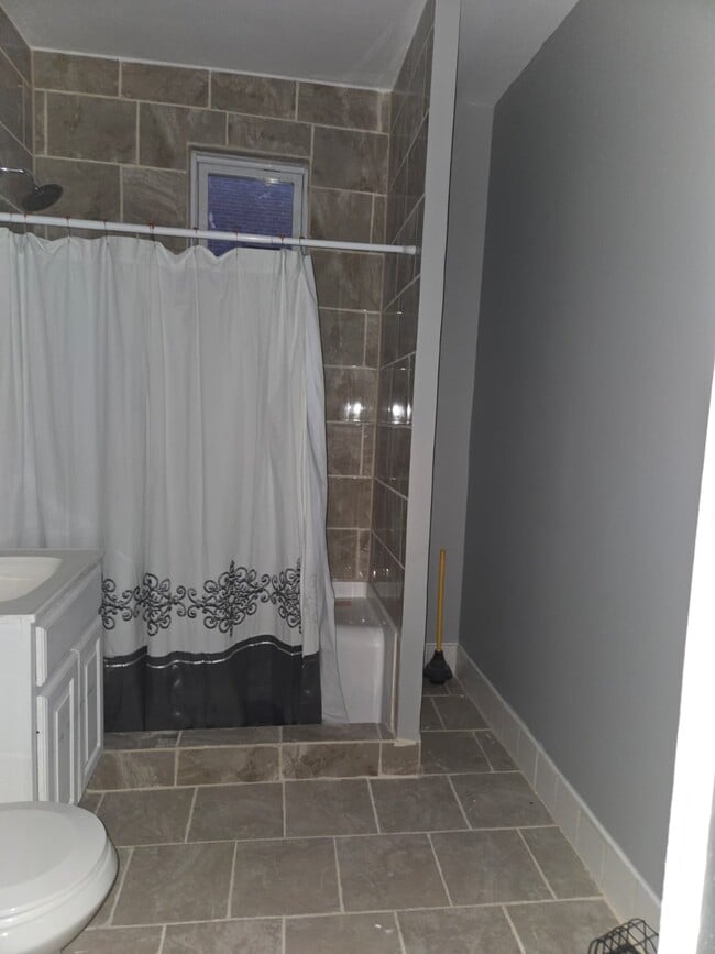 Building Photo - 8445 S Marquette Ave Unit 2