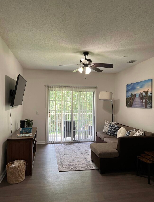 Living Room - 8227 Lobster Bay Ct Unit 204