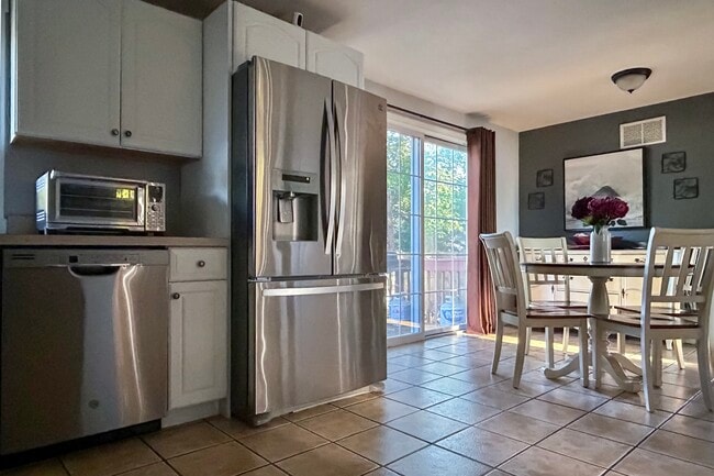 Kitchen and kitchen seating area with bureau - 278 Harrison St