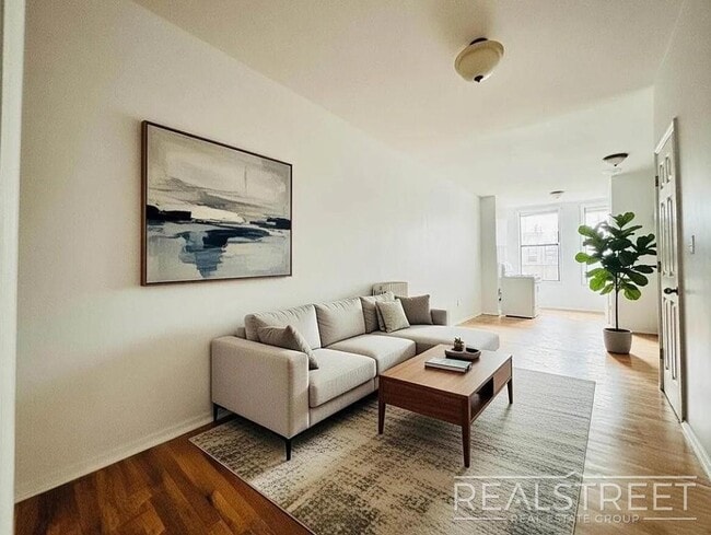 Building Photo - Spacious 1.5-Bedroom Penthouse Apartment in Prime Bushwick!