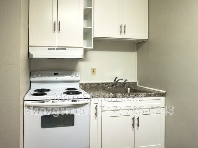 Building Photo - 2108 Walnut St Unit 1