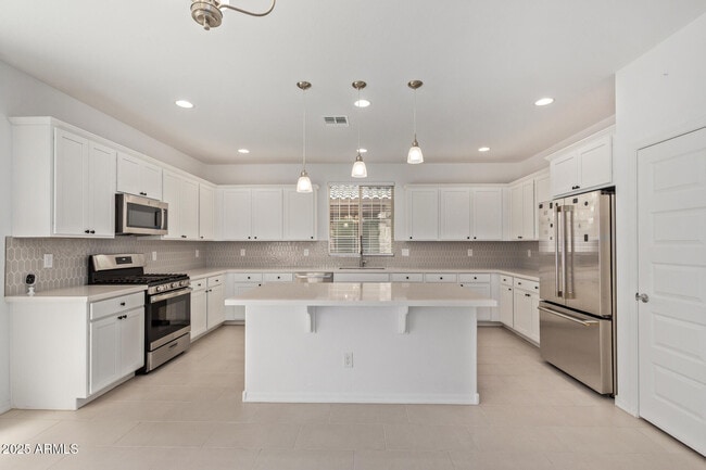 Building Photo - 3813 N 100th Dr