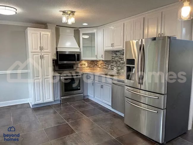 Photo - Updated 4-Bed Home Minutes from Downtown C...