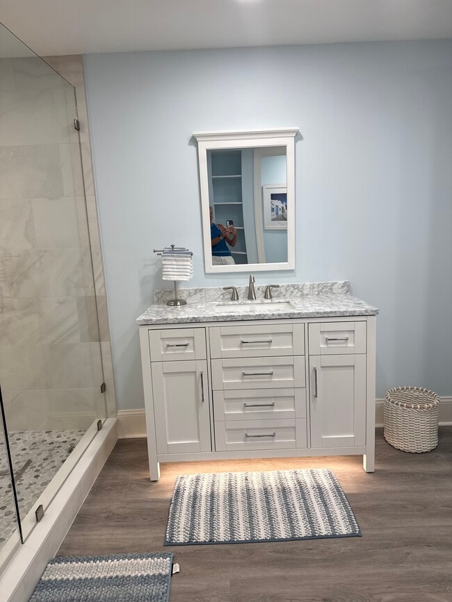 Newly remodeled master bathroom with lighting and vanities - 1031 1st St S Unit 403 Melissa Schultz