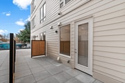 Enjoy a private patio with wooden privacy panels -perfect for fresh air and outdoor relaxation