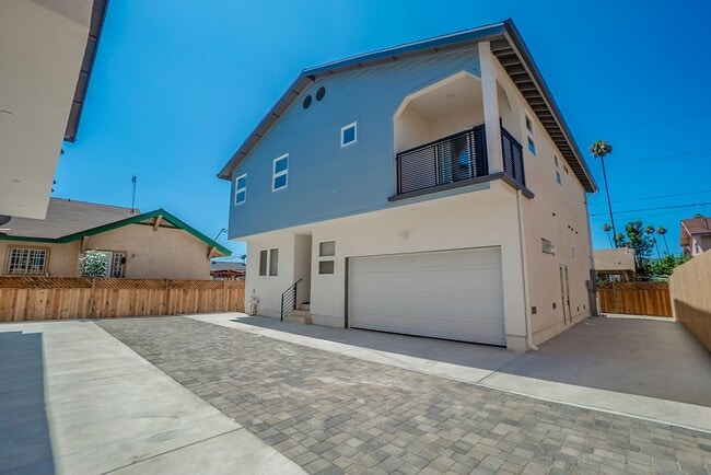 Building Photo - 3915 Brighton Ave Unit 3915 1/2