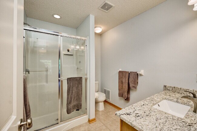 Photo - Spacious 4-Bedroom, 4 Bathroom Plymouth Townhouse with Cozy Fireplace - 2510 Sq Ft of Comfort!