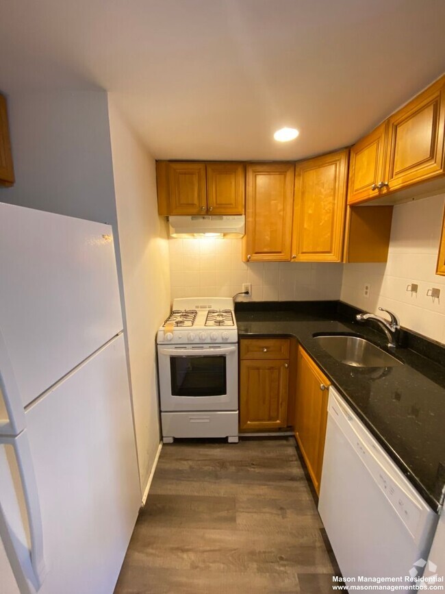 Building Photo - 3 bed 1 bath condo with H & HW in Packard'...