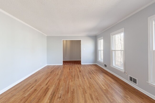 Photo - Spacious 4bd/2.5ba Ranch w/ Two-Car Garage & Large Basement and Screened Porch!