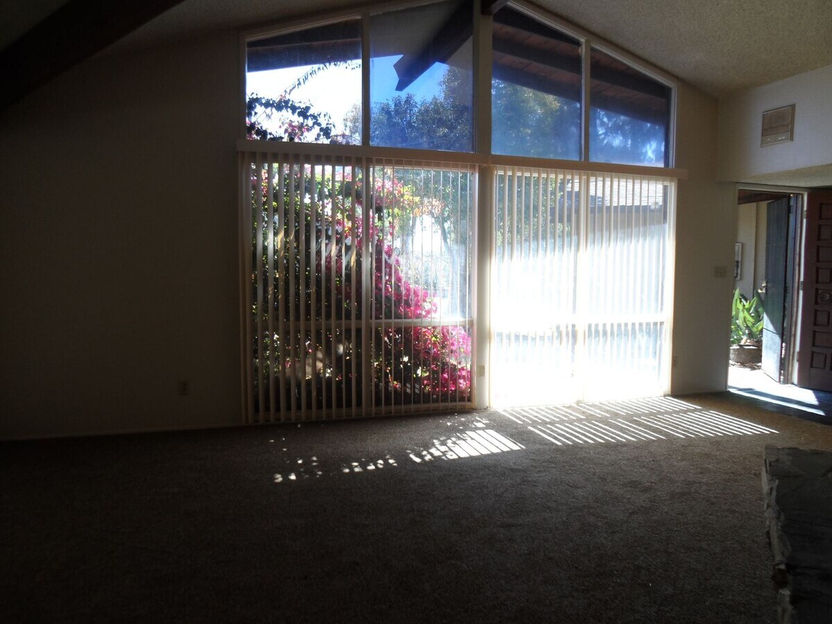 Photo - 3-Bedroom Home on Nearly 1 Acre with Fireplace, Large Backyard & 2-Car Garage