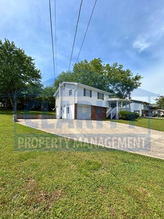 Photo - House with basement garage!