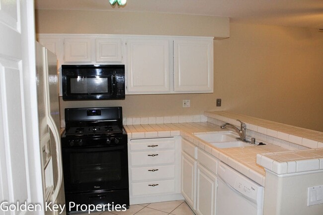 Photo - 2BR/2BATH Ground level Condo in La Costa Alta. 1 Car Garage! Community pool! Water/trash Included! Unit 99